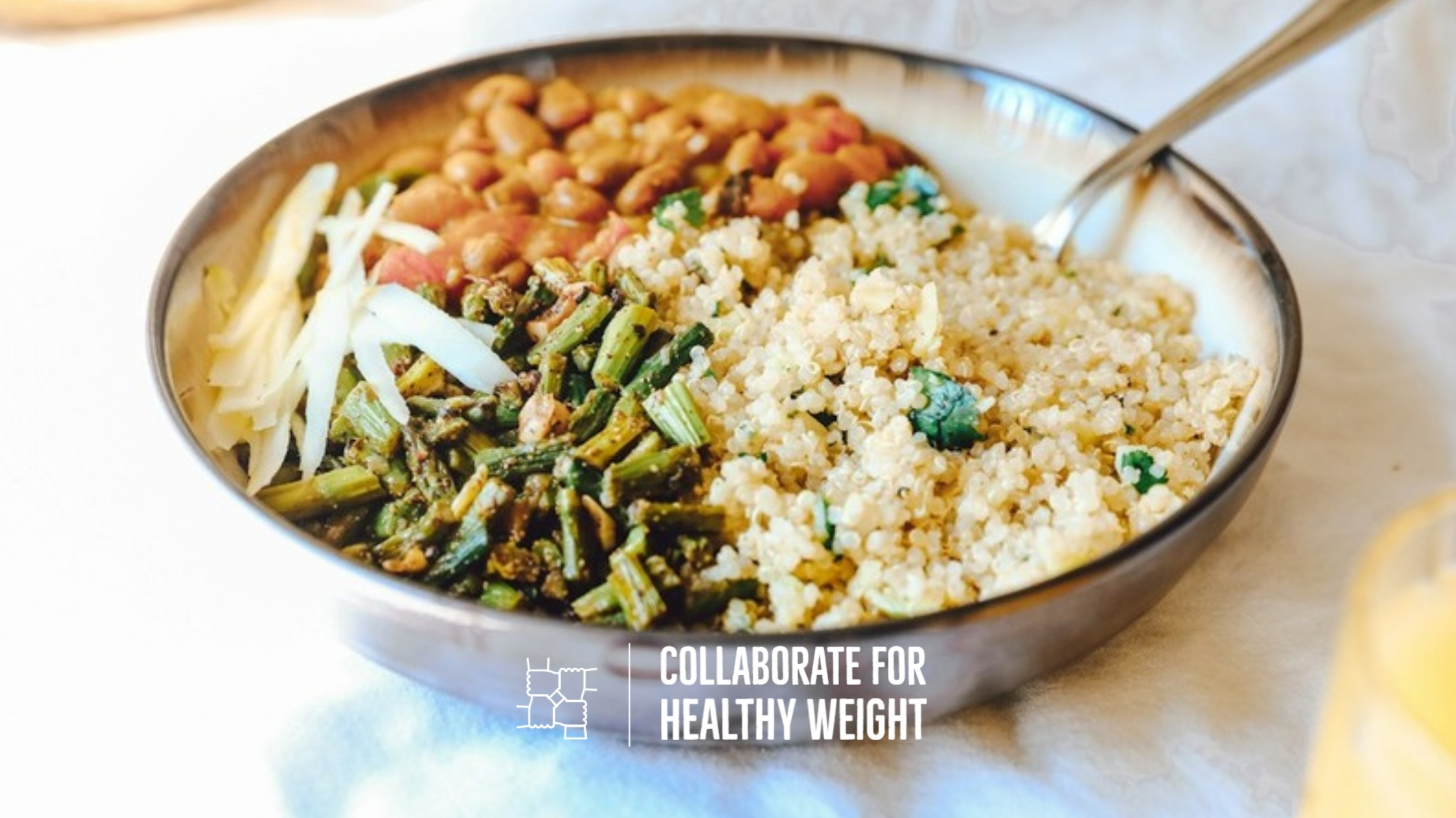 Healthy vegan meal bowl with quinoa, pinto beans, and roasted vegetables from a 7-day vegan meal plan