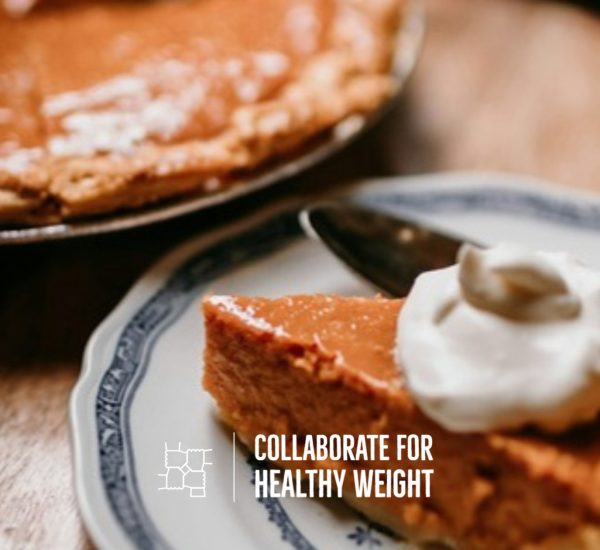 Slice of healthy pumpkin pie with whipped topping