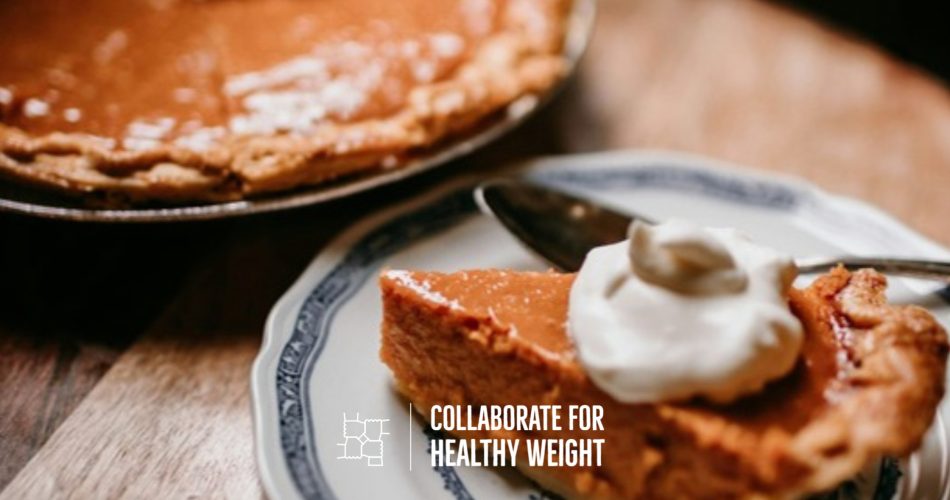Slice of healthy pumpkin pie with whipped topping