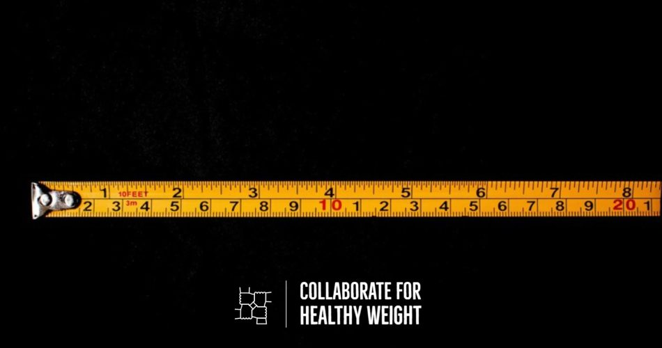Yellow measuring tape for a normal BMI chart by age