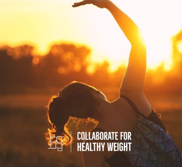 Woman stretching outdoors at sunrise for normal cortisol levels by time of day