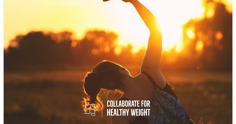Woman stretching outdoors at sunrise for normal cortisol levels by time of day