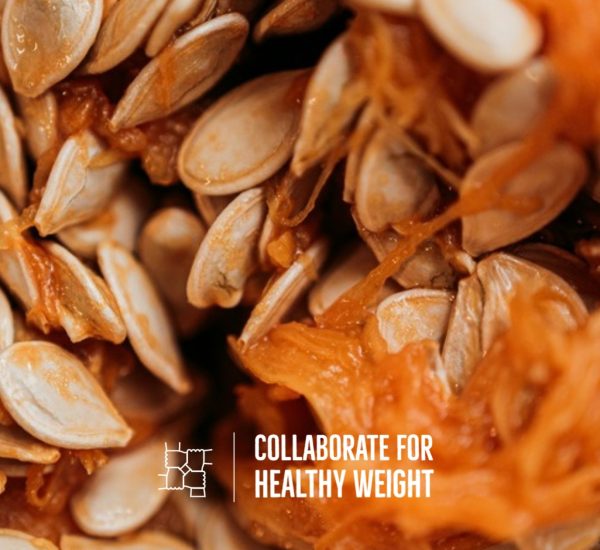 Pile of roasted pumpkin seeds on a table